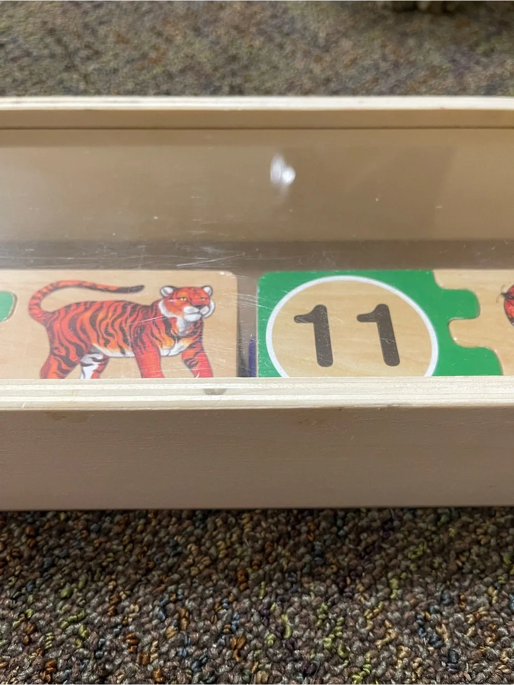 Melissa & Doug self-correcting wooden number puzzle with box and plexiglass lid